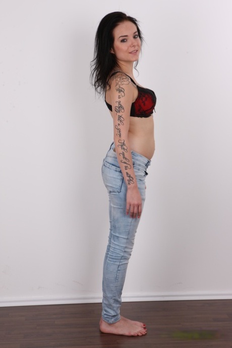 Tattooed amateur stands clothed in bare feet before getting butt naked 65613514