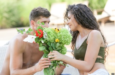 White girl with wavy hair fucks a guy on the patio after receiving flowers 33094192