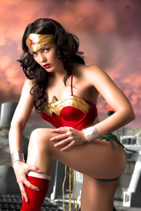 Beautiful brunette peels off her Wonder Woman outfit in a tempting manner 84870275