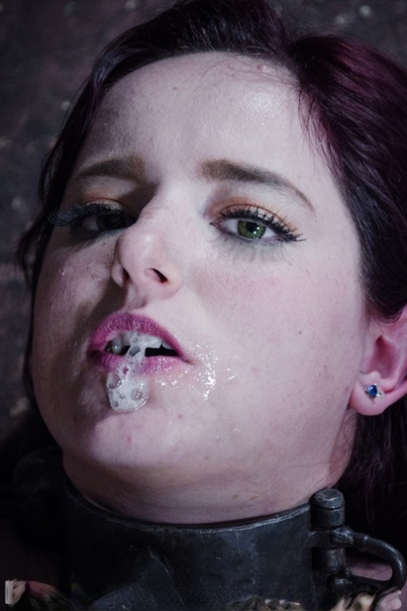 Naked redhead Ariel Blue is thoroughly humiliated during a dungeon scene 87821121
