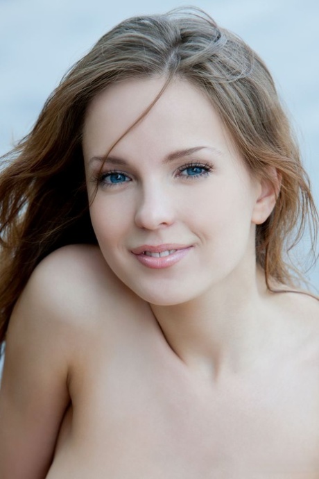 Euro model Ilze wears a smile on pretty face during nude posing on dock 26672838
