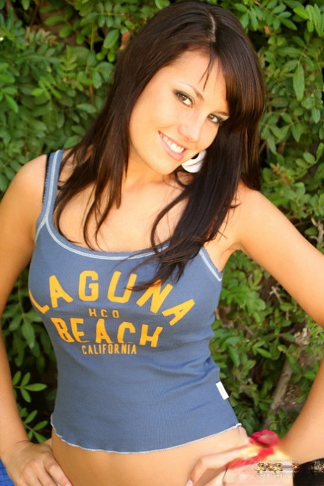 Nice girl Kaydin places her hands over her boobs in a backyard 22242216