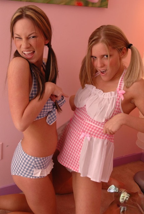 Young lesbians Karen and Kate uncover their boobs in a safe for work manner 65011214