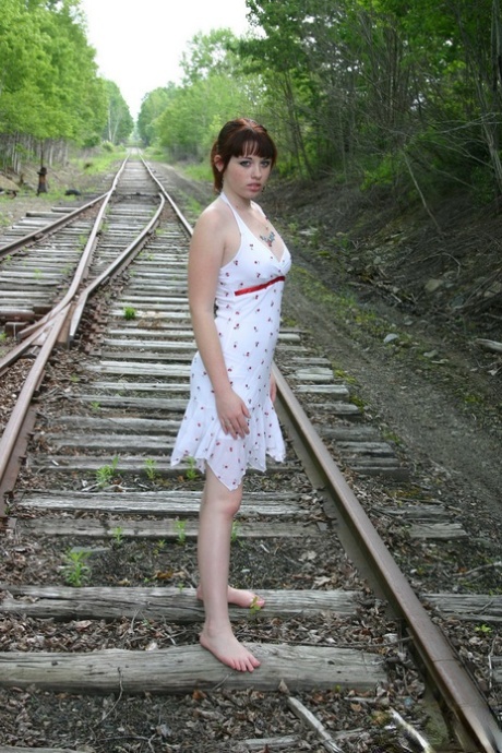 Amateur cutie B4rbi3 teases with her small firm breasts on the train tracks 36113766