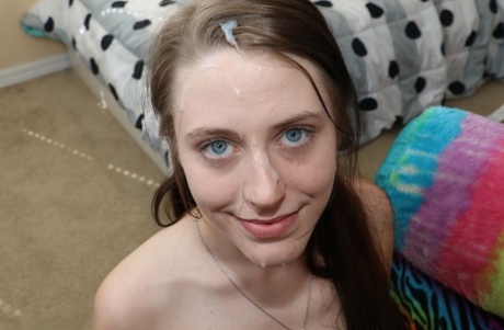 Blue eyed Lainey enoys playing with a hard cock and takes a facial cumshot 15496070