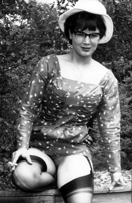 Smoking hot retro models lift their skirts to show hairy pussies in the woods 41543336
