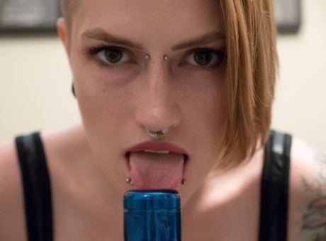 Solo girl with piercings Amanda Marie sticks a flashlight up her vagina 13403800