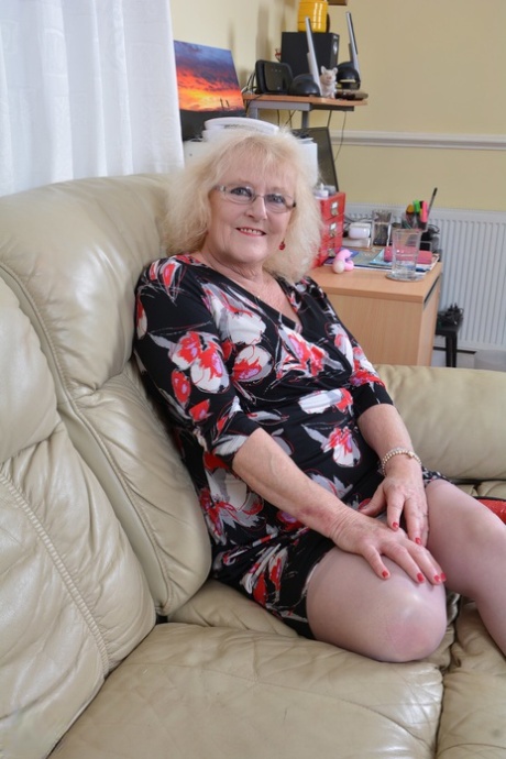 Old British lady in lingerie and tan nylons pleases herself with a vibrator 54077251