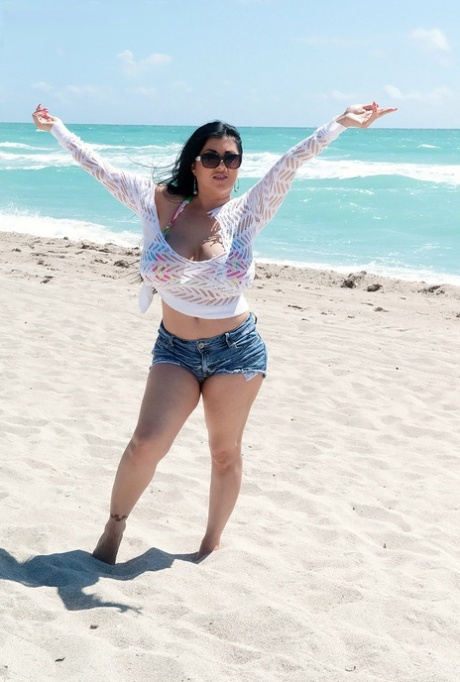 Latina female Daylene Rio releases her massive tits from bikini top 74248888