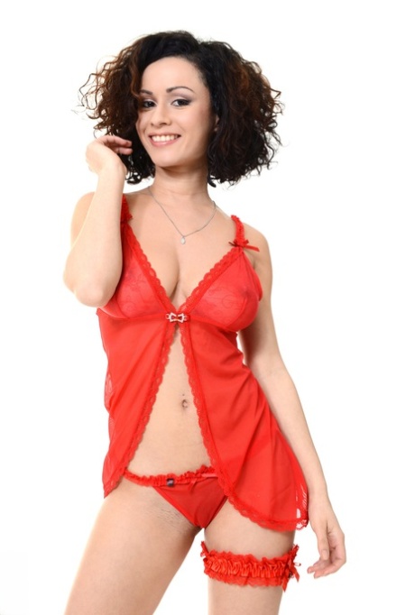 Solo girl Pammie Lee plays with her big hair while doffing red lingerie 59094364