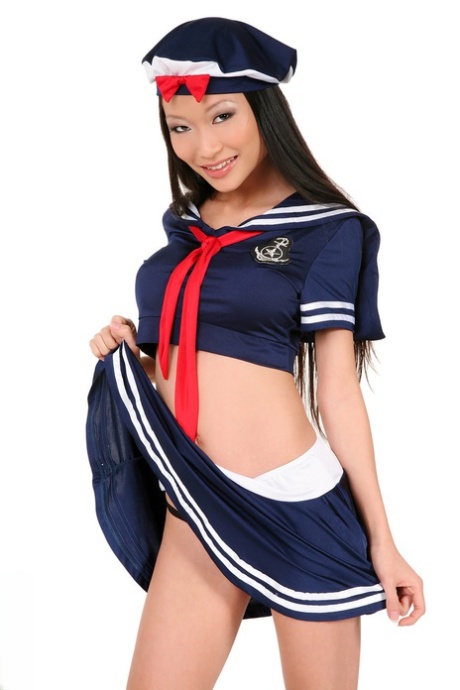 Adorable Asian model Pussykat looses her assets from a cute sailor outfit 91852769