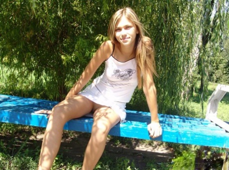 Young looking amateur wears no underwear underneath her short skirt 33215975