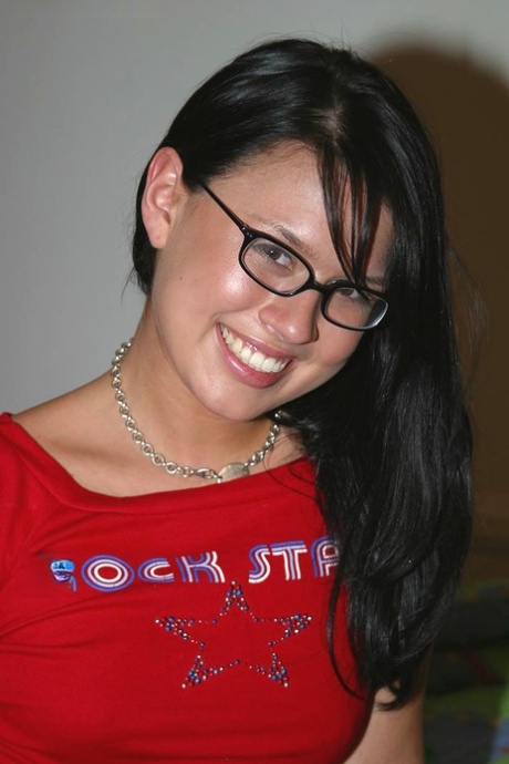 Geeky girl Eva holds her phat ass while making her nude debut in glasses 88718274
