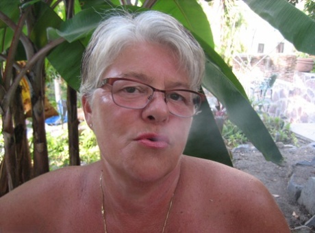 Old woman Girdle Goddess smokes before exposing her fat body on her patio 78059275