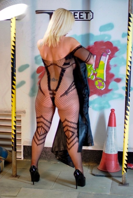 Thick blonde amateur Melody doffs a leather coat before showing her large tits 55946699