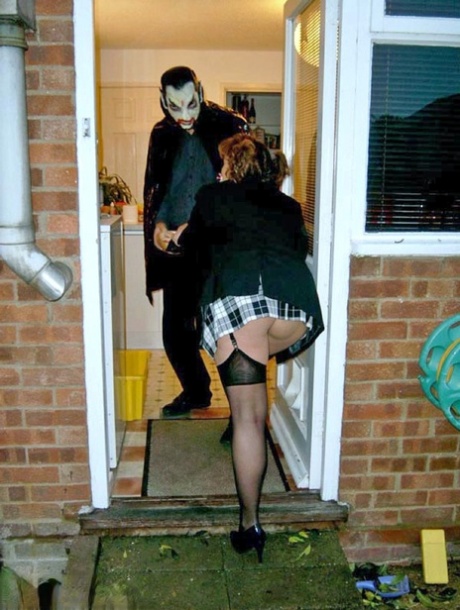UK redhead Curvy Claire blows a man that is dressed as Dracula for Halloween 19848283
