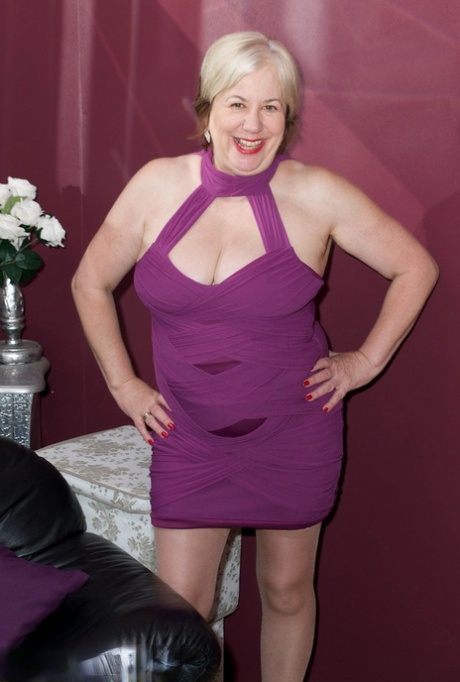UK woman Speedy Bee removes a short dress before standing naked in a yard 29345377