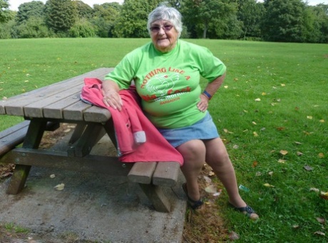 Obese oma Grandma Libby exposes her large tits and butt on a picnic table 29781578