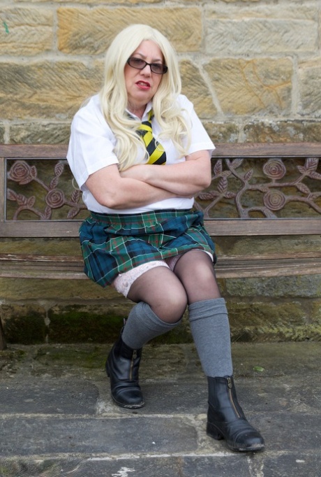 UK blonde Barby Slut masturbates on a garden bench while in schoolgirl attire 61202069