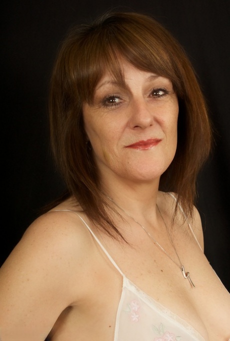 Horny older Pandora sheds sheer white lingerie to spread her mature ass 61391890