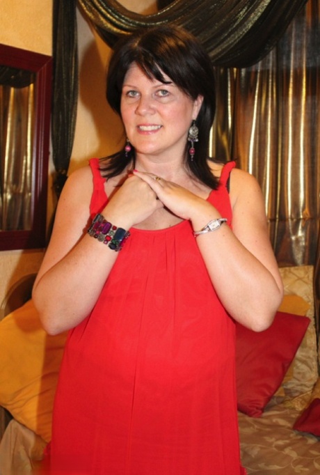 Older first timer Sandy masturbates on her bed in mesh stockings and heels 64578806