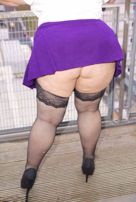 Older British BBW Lexie Cummings exposes her fat ass and twat on a balcony 69341633