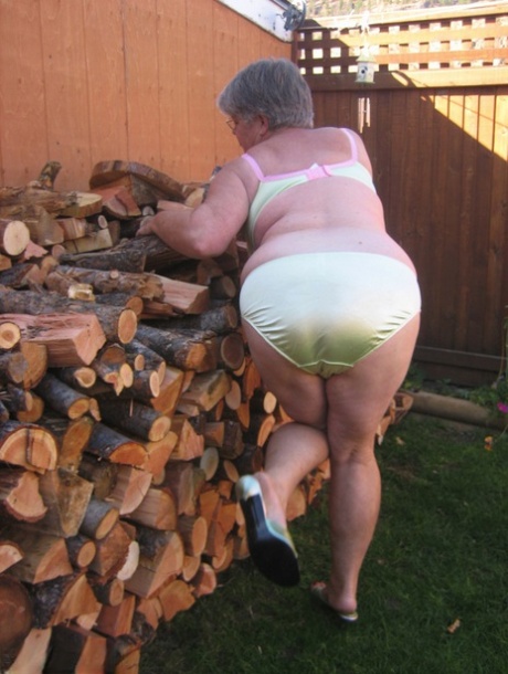 Brazen older granny strips off by the wood pile to show off BBW tits & big ass 70213770