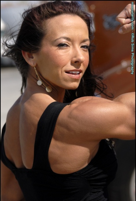 Bodybuilder Patricia Beckman poses in swimwear and a little black dress 40672540