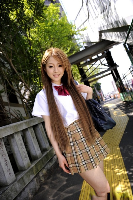 Innocent Japanese schoolgirl Ria Sakurai flashes sexy white panties in public 74003681