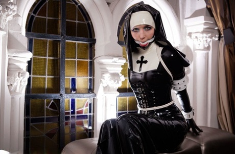 Fully clothed nun is rope bound in latex attire and platform heels 21216774