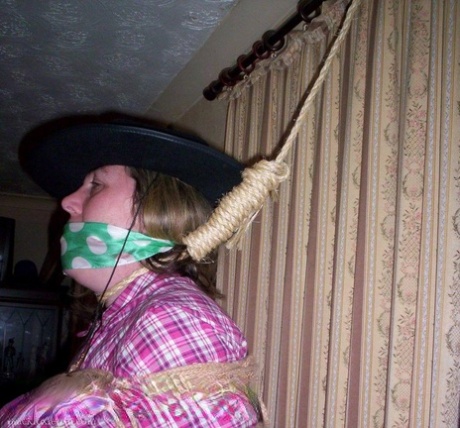 Country girl is fitted with a noose while gagged with her panties in her mouth 63751940