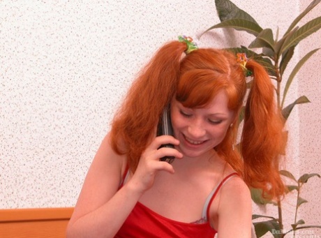 Young looking redhead wears her hair in pigtails during sex with her boyfriend 41870099