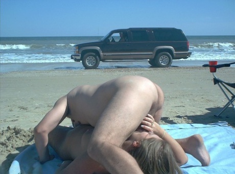 Glasses wearing amateur BBW gets gangbanged on a nude beach 50232672