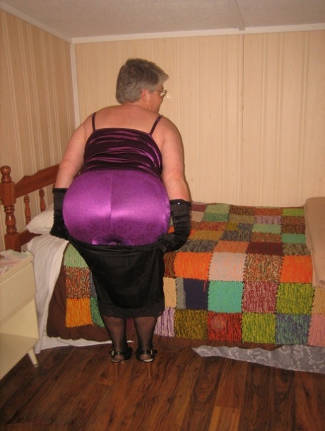 Old fatty Girdle Goddess gets naked in her bedroom while wearing black gloves 61375561