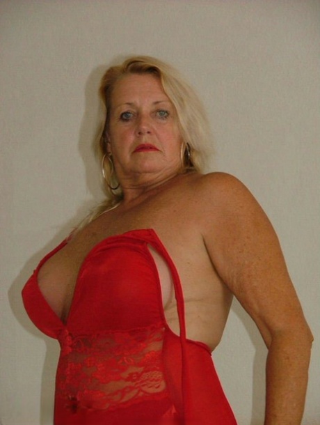 Mature blond in red lingerie and hosiery sucks her vibrator after masturbating 64641977