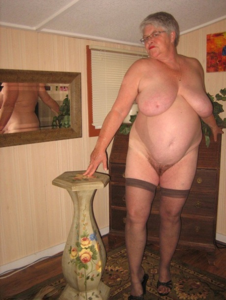 Fat old woman Girdle Goddess doffs black lingerie to pose nude in stockings 77836289
