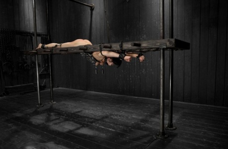 Brunette girl is subjected to breathe play during an extreme bondage session 78585750