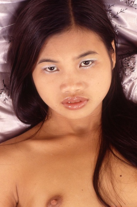 Tiny Thai girl spreads her wet pussy after dildoing in the nude on bed 31581101