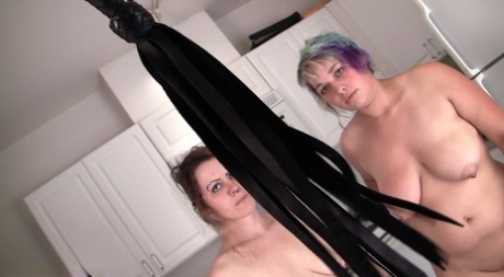Lesbian women kiss before swallowing each others piss in a kitchen 27748943