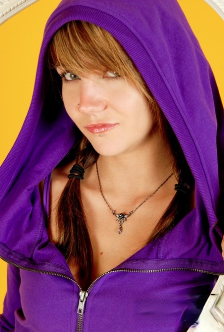 Charming teen Andi Land exposes a breast while fooling with a hula hoop 96075420