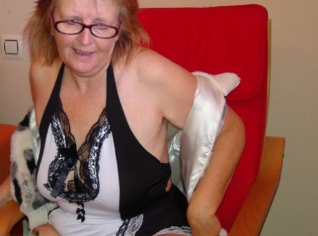Old amateur Abby Roberts bares her tits and twat in striped thigh high socks 93566567