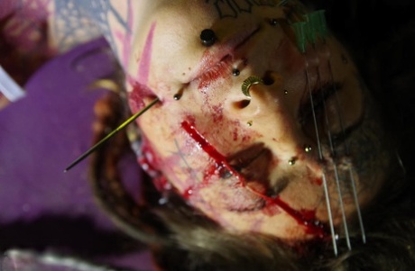 Tattooed girl sports a bloody face before showing her pussy and boobs 44538157