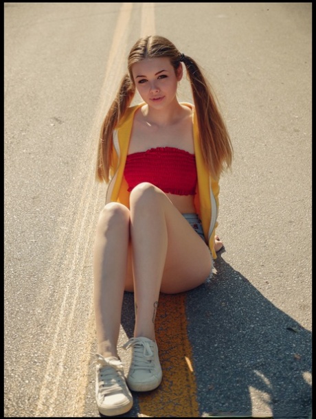 Young looking girl Lana Lea holds her pigtails after getting totally naked 10552845