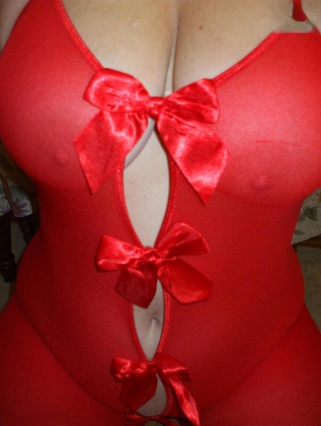 Aged amateur Busty Bliss slurps on a cold beverage while modeling red lingerie 39812821