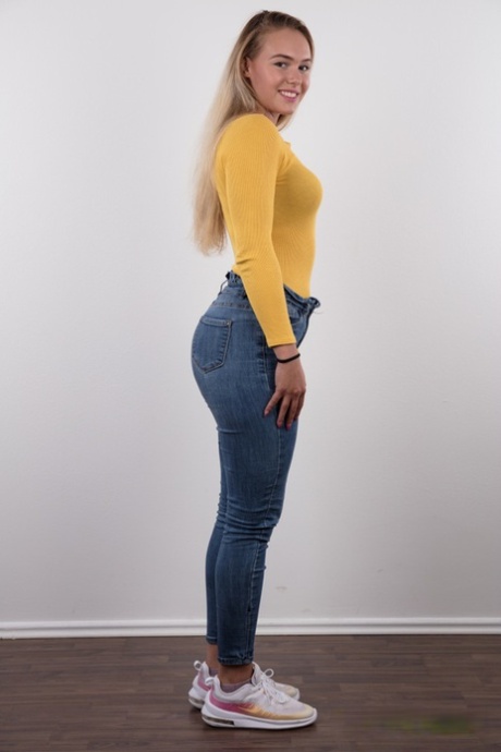 Fully clothed 18 year old Silvie stands butt naked after removing her clothes 23081240