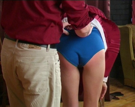 Blonde student has her ass turned bright red by her schoolteacher 28355979