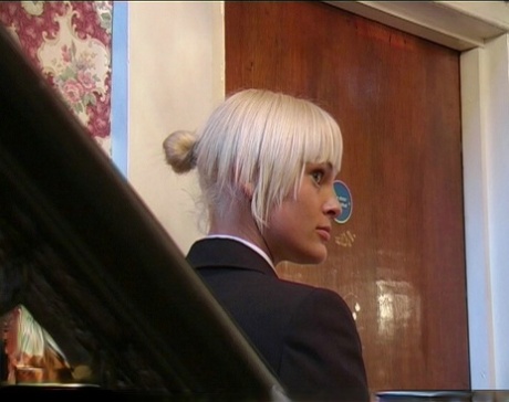 Blonde schoolgirl holds her bare ass after a brutal caning 46208188