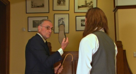 Misbehaving student receives a brutal caning from her old stepfather 55288170