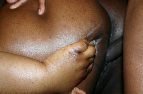 Ebony fatty displays her oily body before sex with her ebony lover 61308441