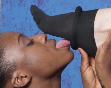 Caucasian lesbian has her feet and heels licked by her ebony lover 90131119
